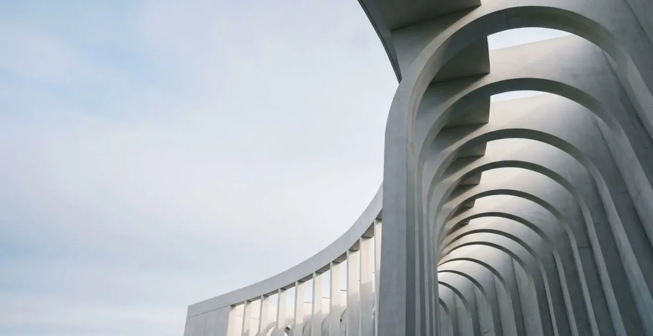 Environmental wide-angle photograph showing automated workflow symbolism through architectural elements